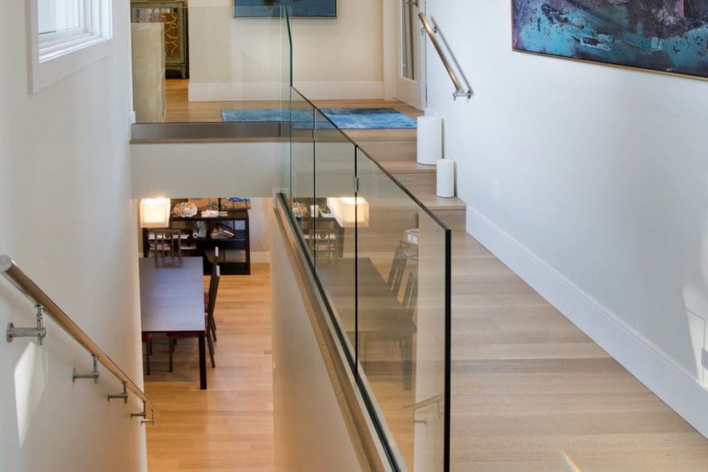 Bayview Project By Renova Homes & Renovations Calgary, Alberta glass railings leading to your master bedroom sanctuary