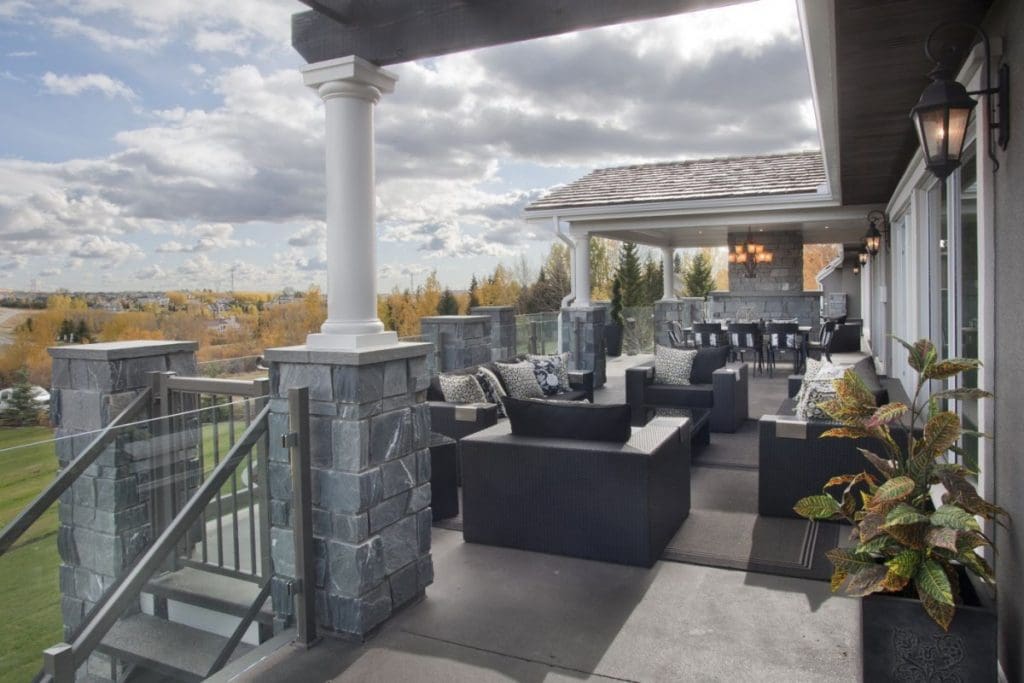 Bearspaw exterior with glass walls and outdoor barbequing station