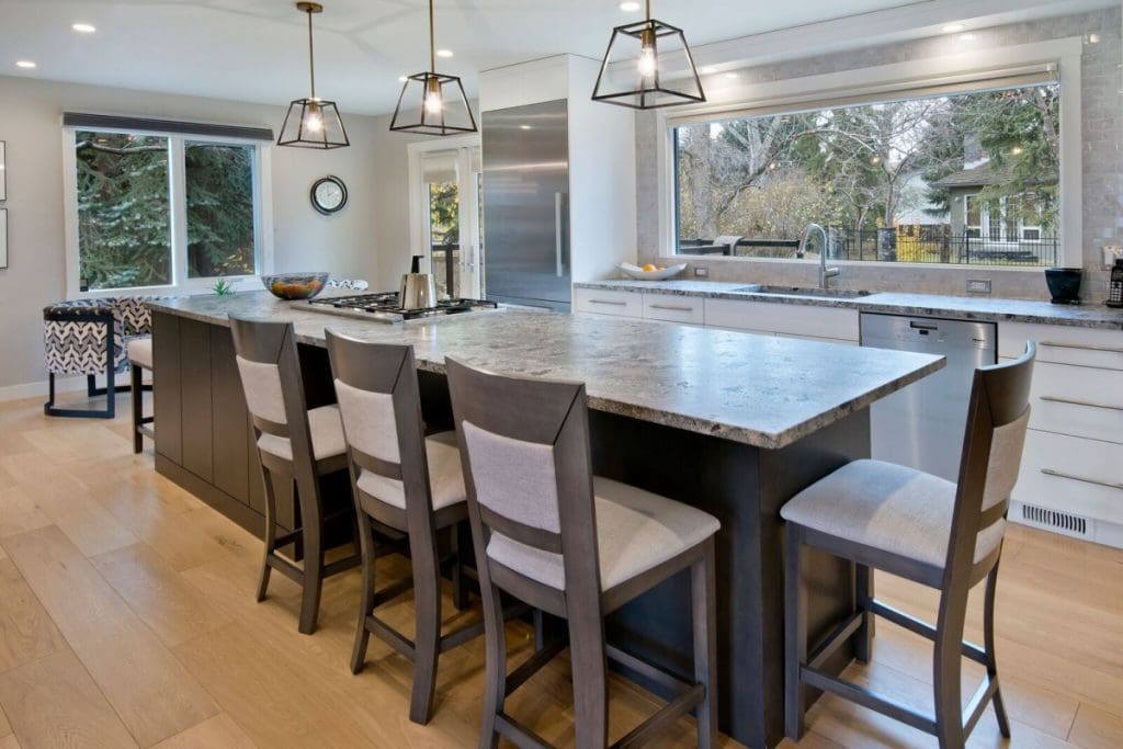 kitchen renovation with granite countertops and wide plank hardwood oak floors