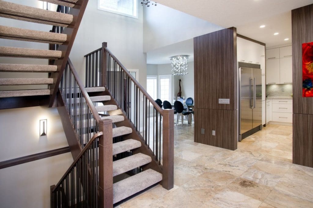 Kitchen renovation with spacious living spaces and wooden wall features