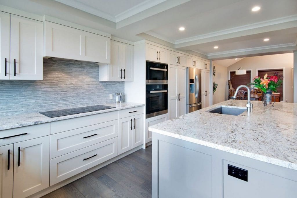 Edgemont Project Two By Renova Homes & Renovations Calgary, Alberta with full parameter white custom cabinetry
