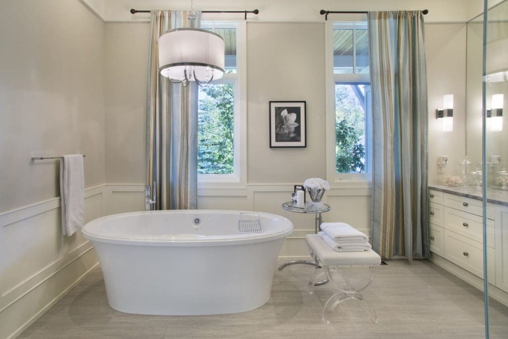 Elbow Valley Ensuite Project By Renova Homes & Renovations Calgary, Alberta with stand alone bathtub and beautiful windows