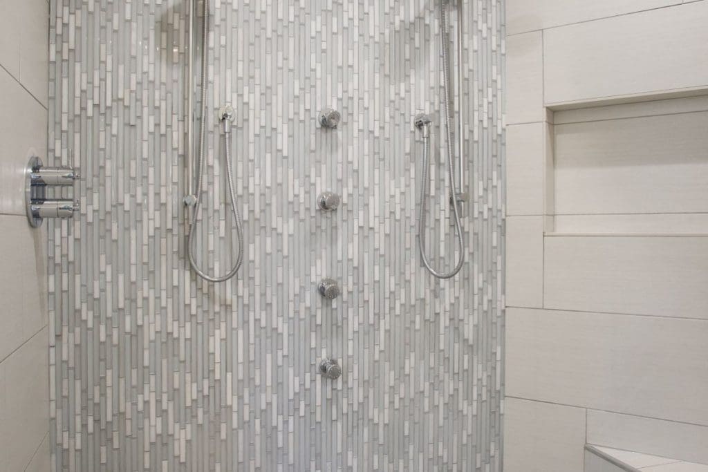 Elbow Valley Ensuite Project By Renova Homes & Renovations Calgary, Alberta stone tiled shower