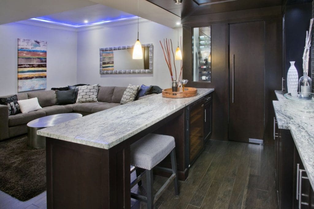 Hamptons Basement Project By Renova Homes & Renovations Calgary, Alberta basement bar and movie room