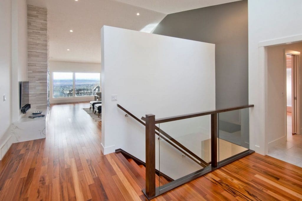 Hawkwood Renovation By Renova Homes & Renovations Calgary, Alberta with a beautiful front entryway leading into the spacious living room