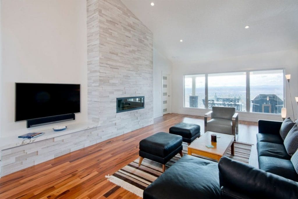 Hawkwood Renovation By Renova Homes & Renovations Calgary, Alberta living room and deck