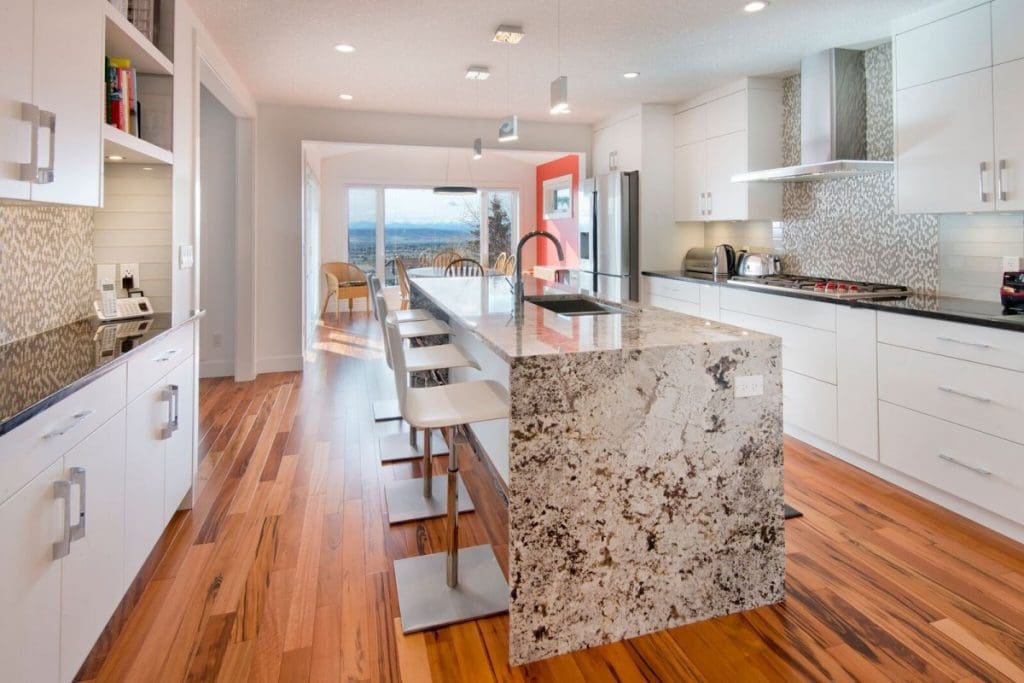 Bearspaw exterior with glass walls and outdoor barbequing station