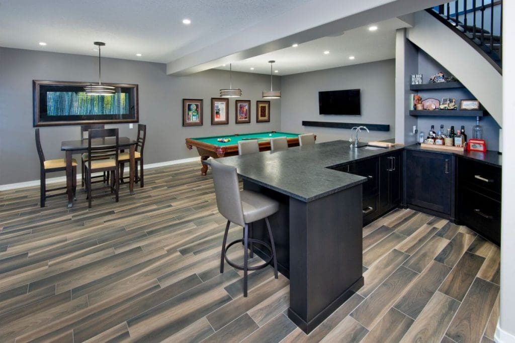 Mckenzie town in calgary basement bar mancave renovation by renova home and renovations
