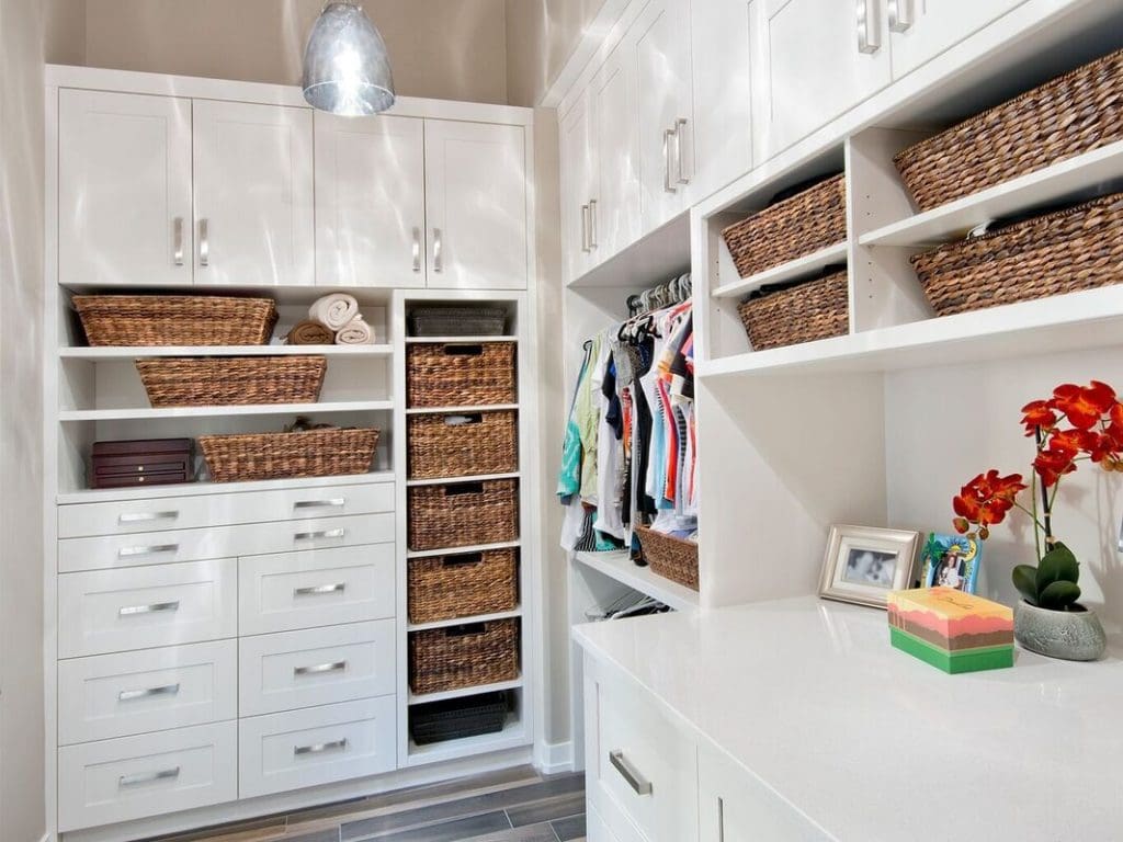 Mckenzie Renovation By Renova Homes & Renovations Calgary, Alberta custom cabinet closet with wicker baskets