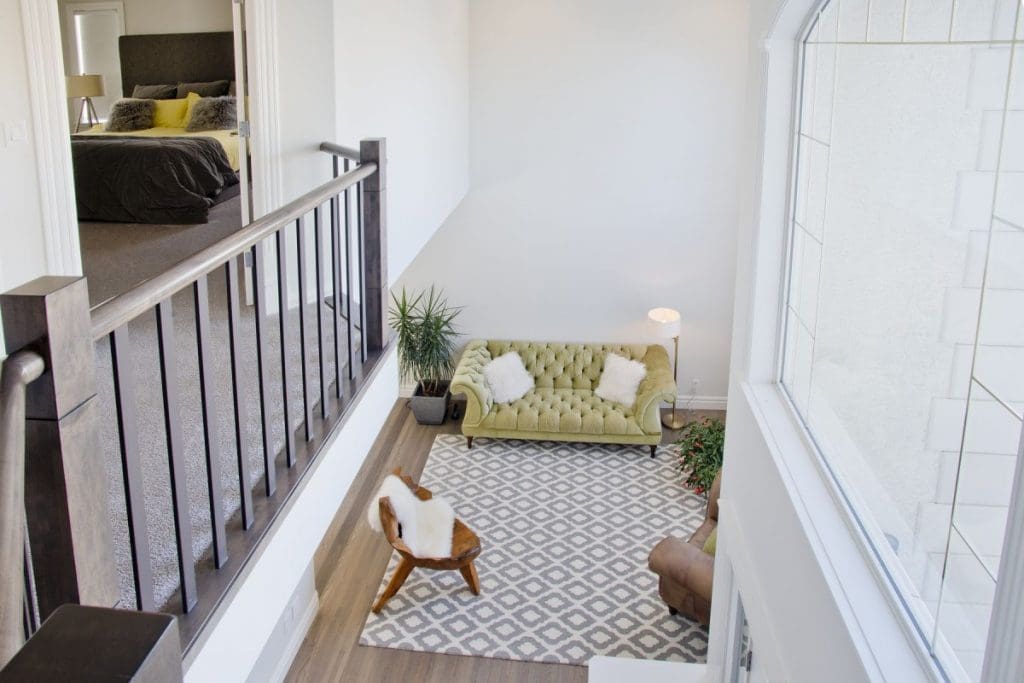 Patterson Interior Project By Renova Homes & Renovations Calgary, Alberta grand front entry way with glorious large arched windows and natural light beaming through