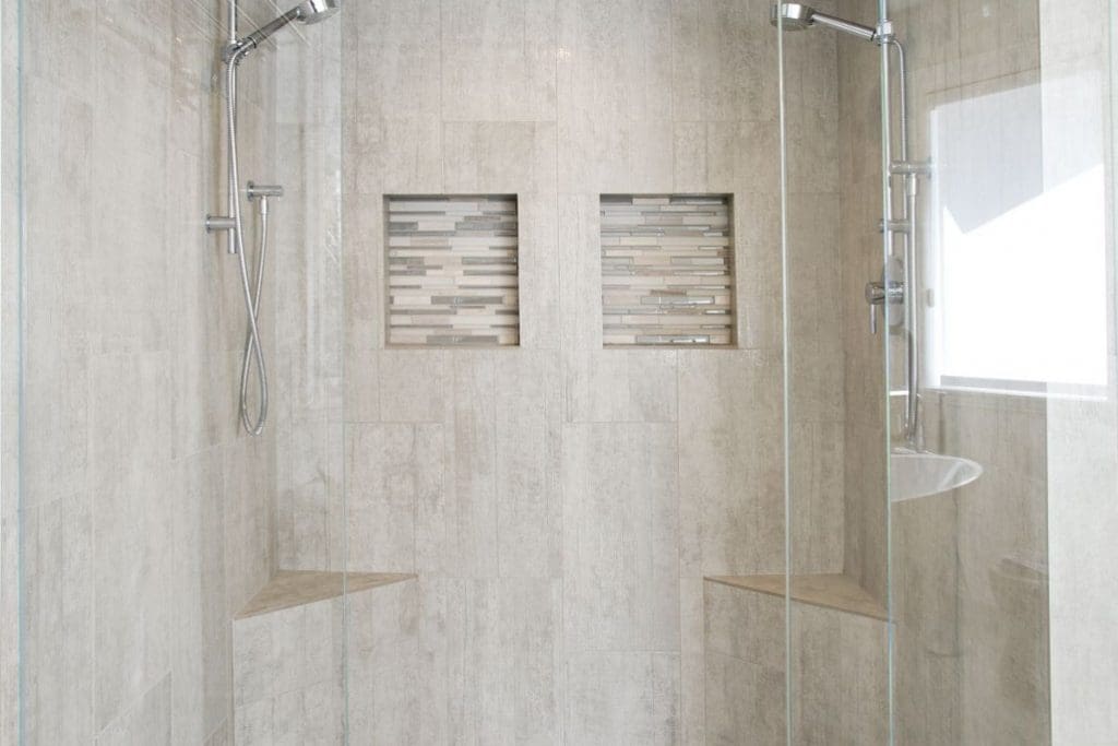 Patterson Interior Project By Renova Homes & Renovations Calgary, Alberta double shower head tiled shower