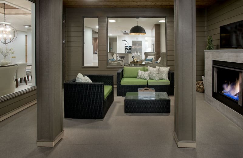 Patterson Showhome exterior patio with fireplace By Renova Homes & Renovations Calgary, Alberta