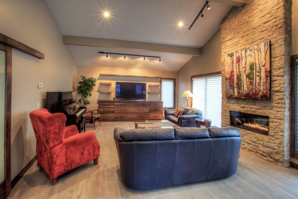 Silver spring renovation with custom vanity and stone fireplace by renova homes and renovations