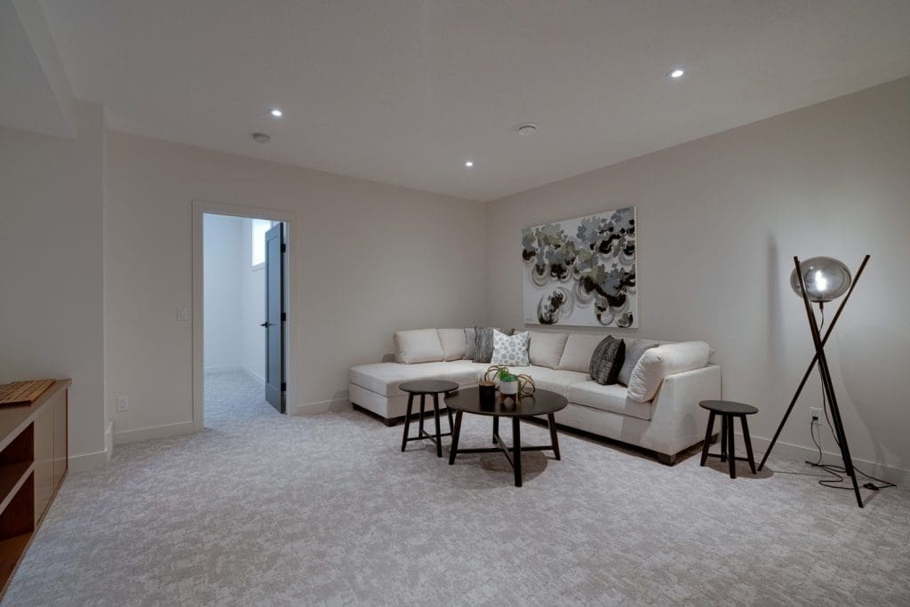 Arbour Lake Renovated basement Living Space by Renova Homes & Renovations In Calgary, Alberta