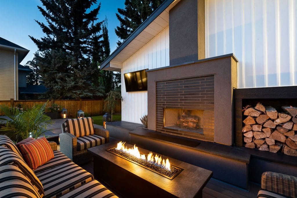 Backyard fireplace Renova Homes & Renovations In Calgary, Alberta