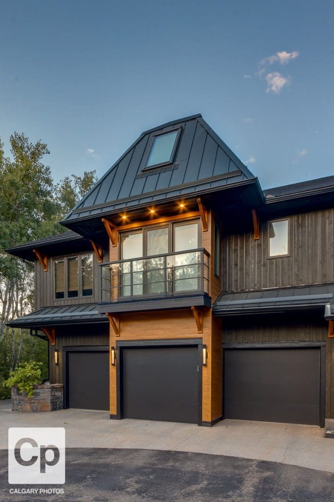 Springbank Renovation By RENOVA HOMES & RENOVATIONS View of garages