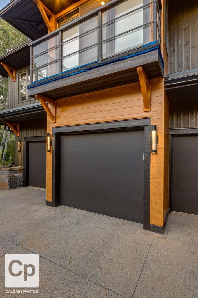 Springbank Renovation By RENOVA HOMES & RENOVATIONS Close of garage door