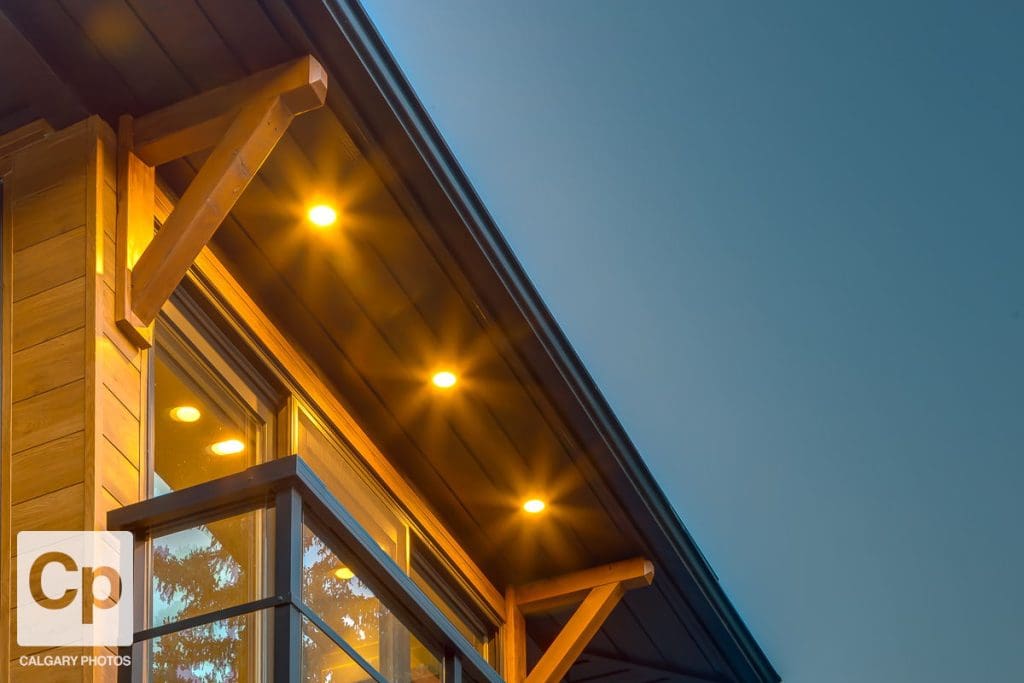 Springbank Renovation By RENOVA HOMES & RENOVATIONS close up of eavestrough and lights