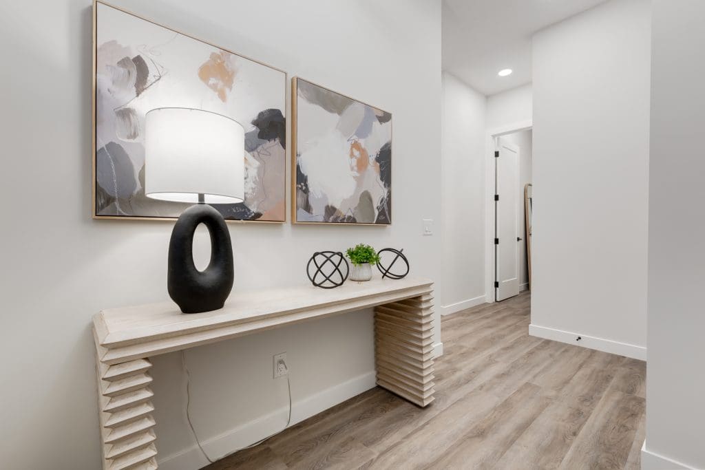 Front Hallway with light wooden credenza
