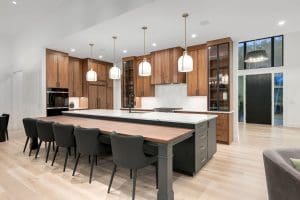 Kitchen and large island with two toned cabinetry