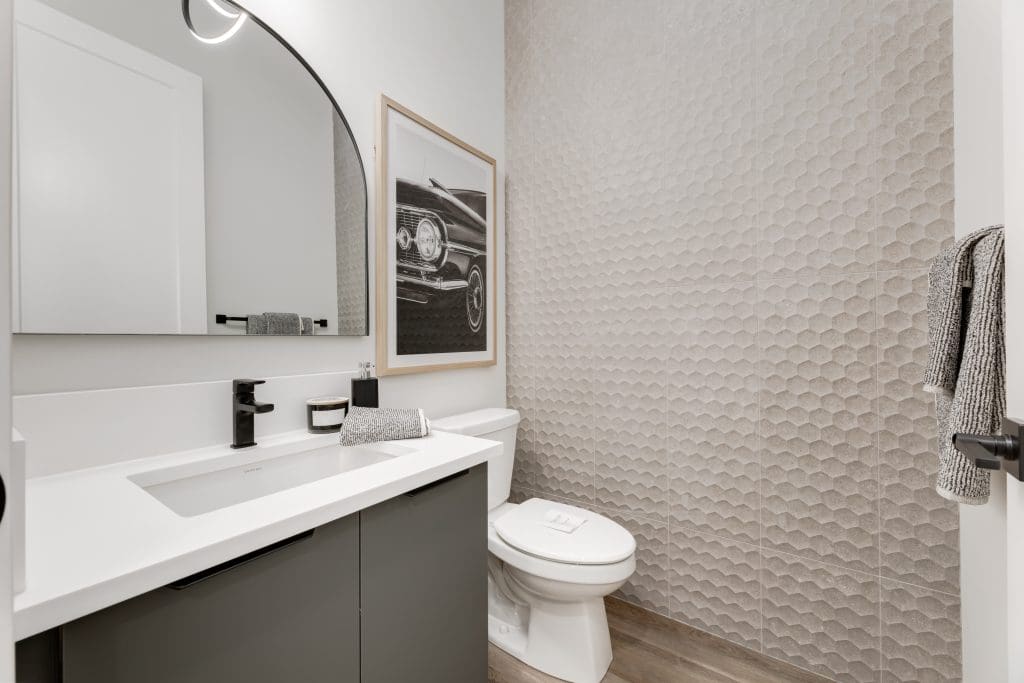 Bathroom with accent tile wall