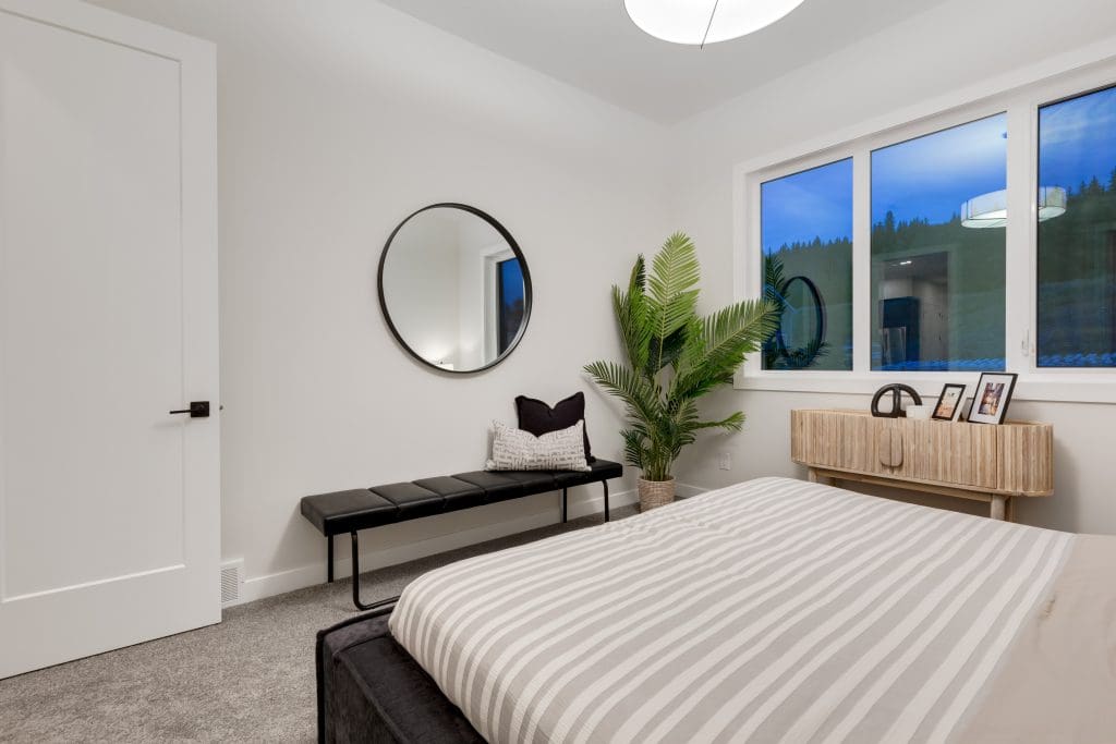 Master bedroom with green space out of the window