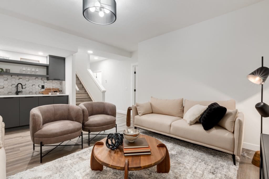 Basement living room with bar and loveseat